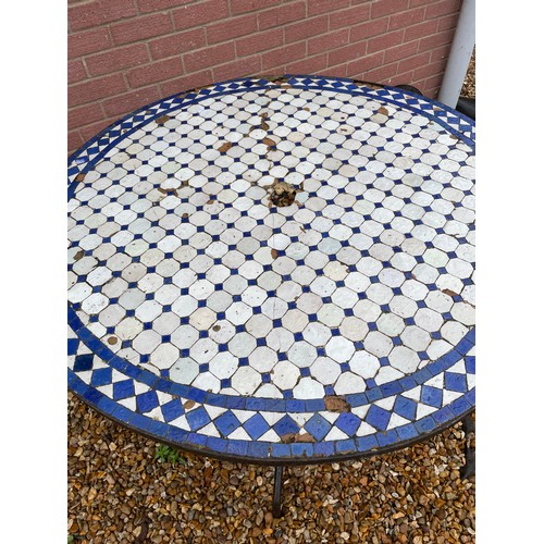 525 - Mosaic tile top garden table on metal legs with wear to tiles see all pictures