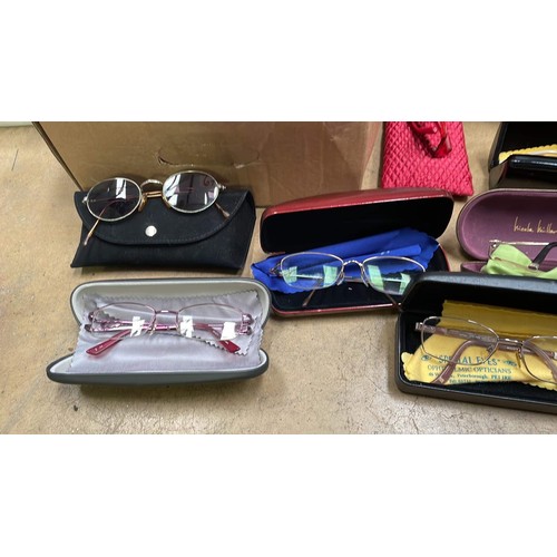 672 - Collection of mixed sunglasses & cases