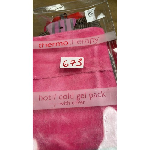 673 - 5 hot water bottles & covers