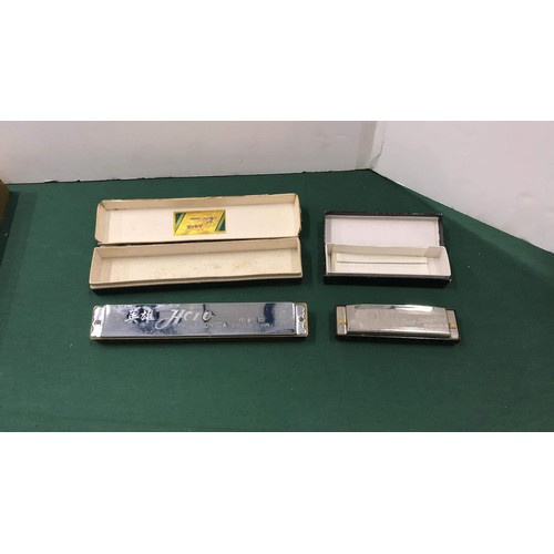 32 - Two harmonica's boxed