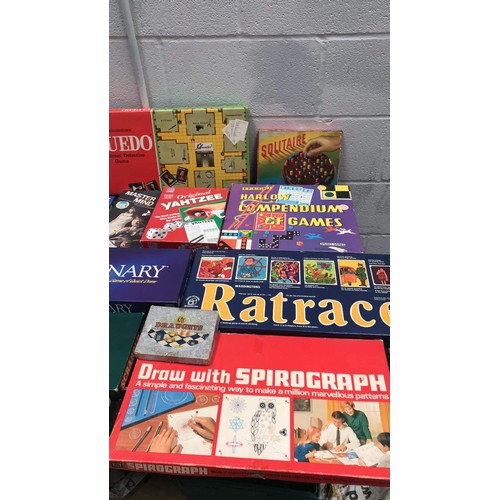 28 - large assortment of board games to include rat race scrabble and more