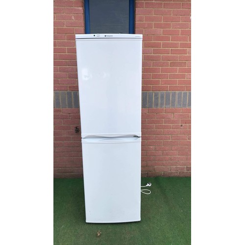 74 - Tall upright fridge freezer in white used by hotpoint