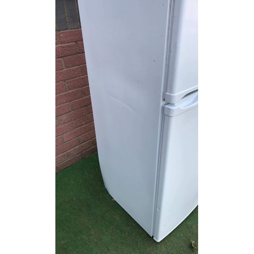 74 - Tall upright fridge freezer in white used by hotpoint