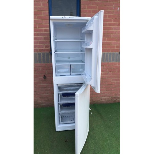 74 - Tall upright fridge freezer in white used by hotpoint