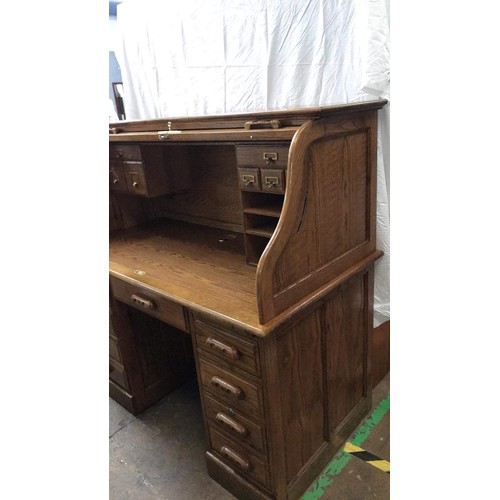 99 - Oak rolled top desk with modern computer layout