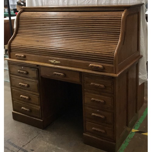 99 - Oak rolled top desk with modern computer layout