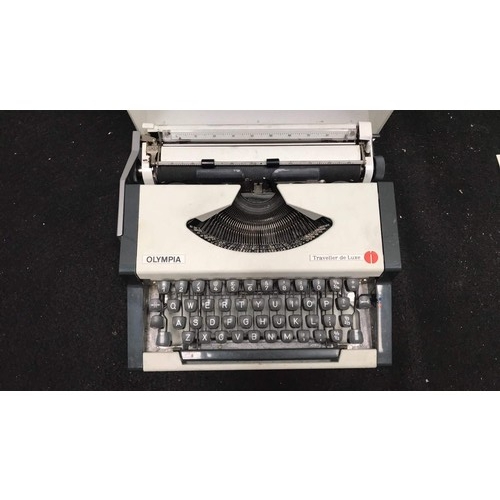 48 - small portable typewriter