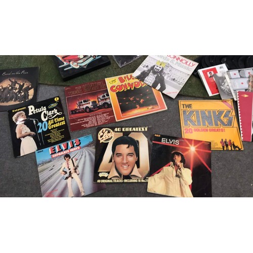 238 - Quantity of mixed artist & music LP's & 45s singles to include Elvis Presley, Top of the pop... 