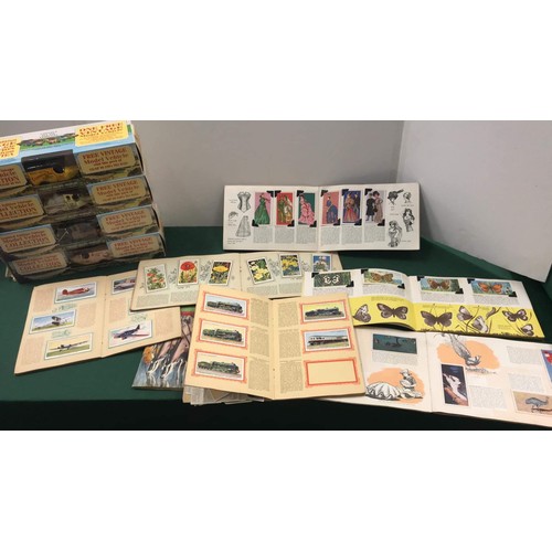 221 - 4 limited edition co-op cars boxed, cigarette cards and tea cards