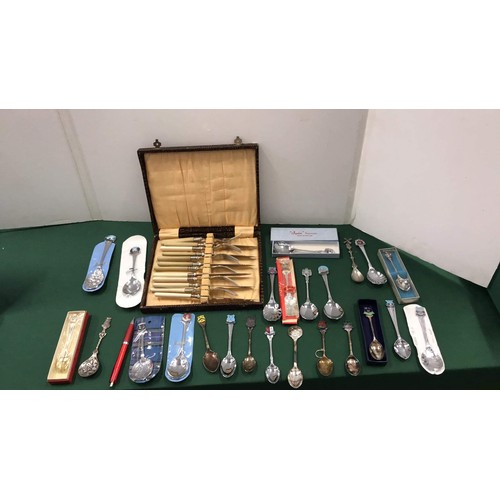 218 - Spoons & cutlery set