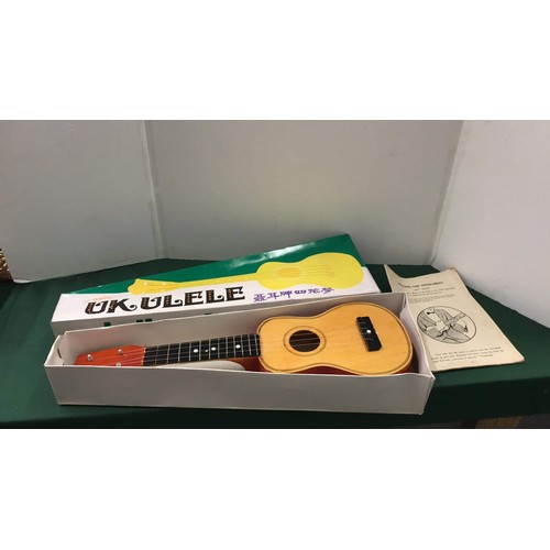 195 - Ukulele in box