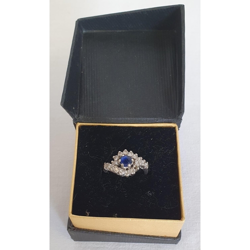 284 - Continental White Metal Sapphire and Diamond Ring