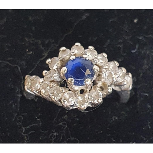 284 - Continental White Metal Sapphire and Diamond Ring