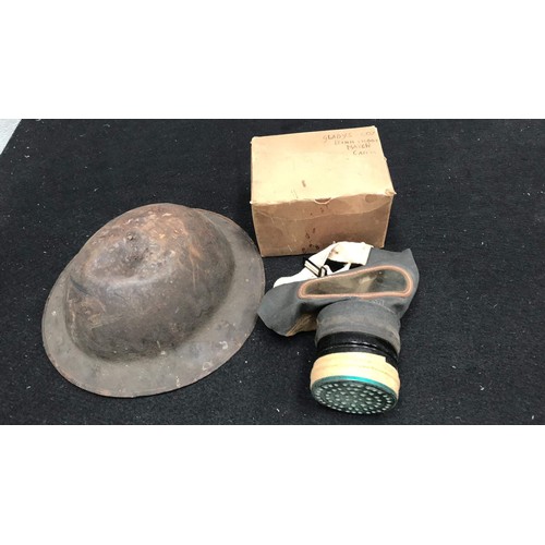 334 - Military helmet and gas mask