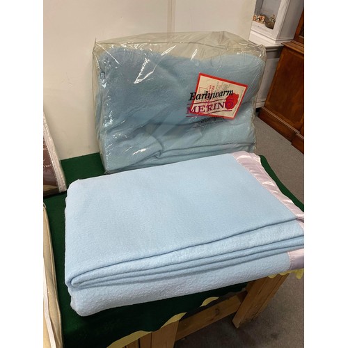 378 - 4 blankets - some new in package including fleece TV blanket