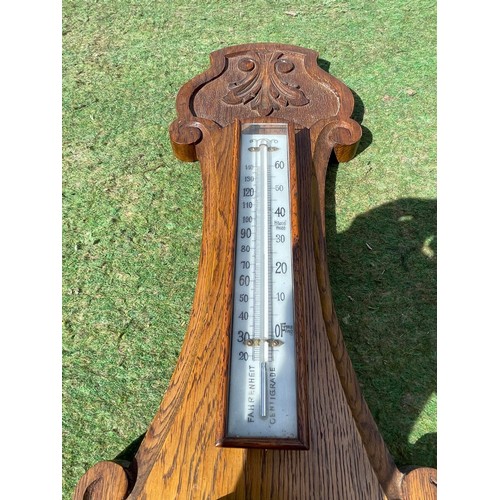 396 - oak framed barometer with a cracked Bessel