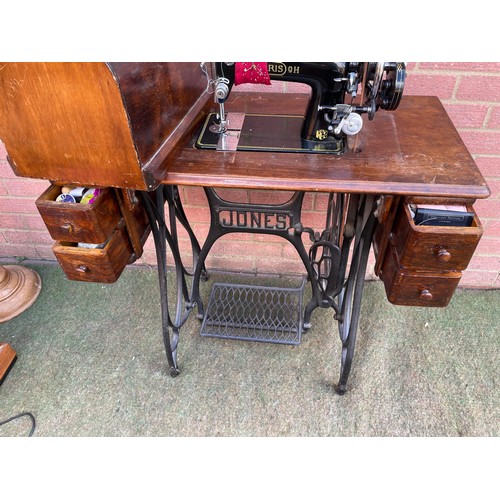 392 - Jones sewing machine includes sewing items in draws