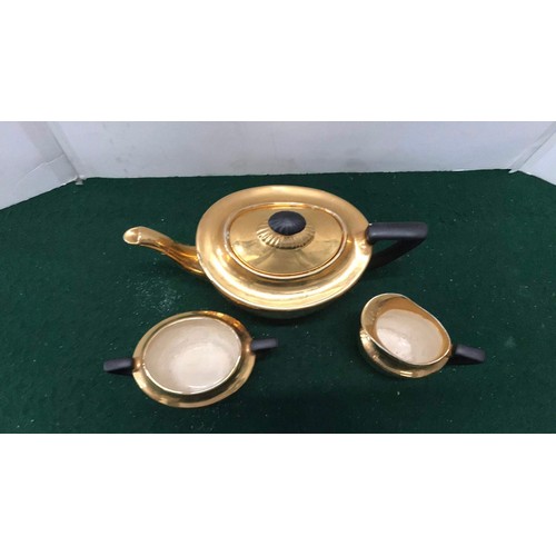 457 - crown Devon gold coloured tea set