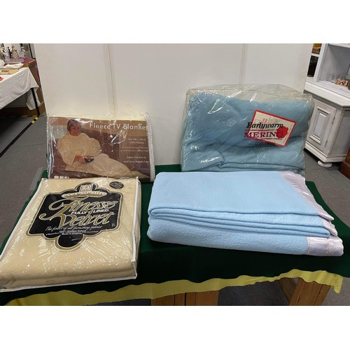 378 - 4 blankets - some new in package including fleece TV blanket