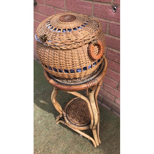 435 - bamboo stand with whicker basket  containing snake