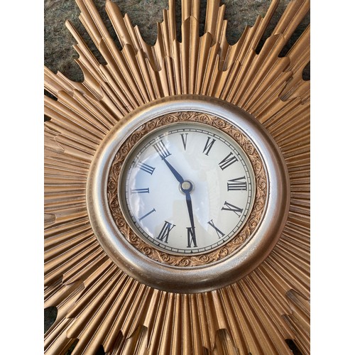 418 - sun burst clock