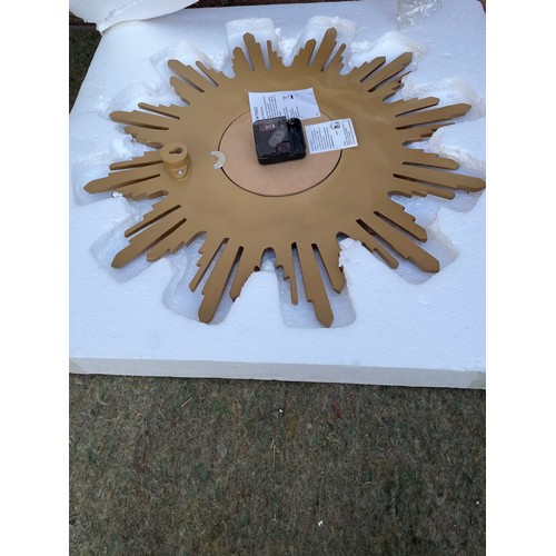 418 - sun burst clock