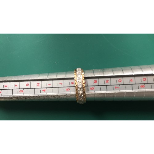 296 - 18ct yellow and white gold with diamonds eternity ring size L weight 2.93g