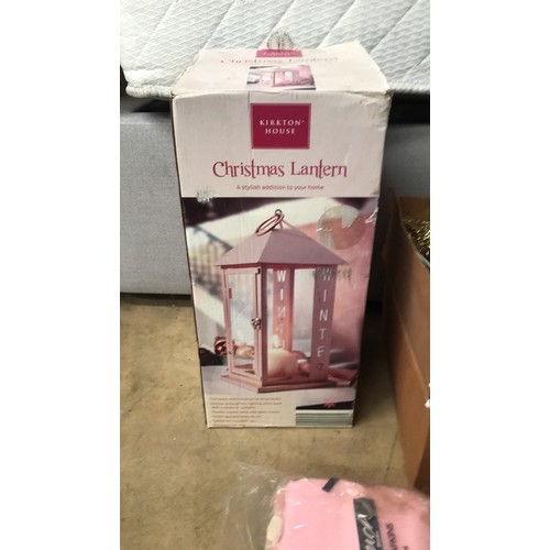 658 - Christmas items including packaged Christmas lantern