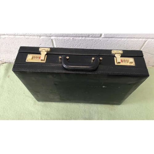 51 - UNUSED BLACK BRIEF CASE WITH CODE