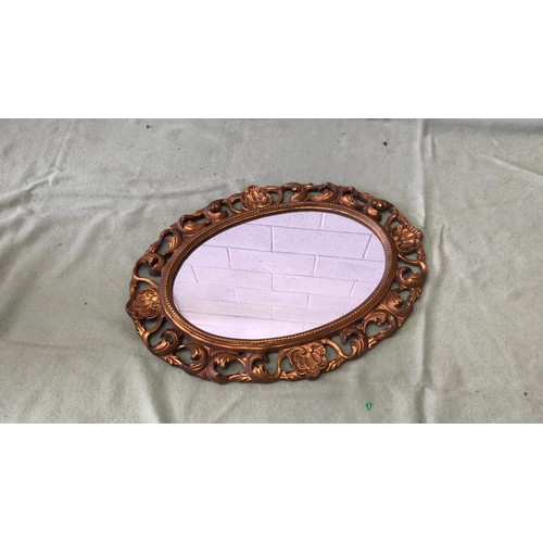 20 - GOLD COLOURED OVAL MIRROR