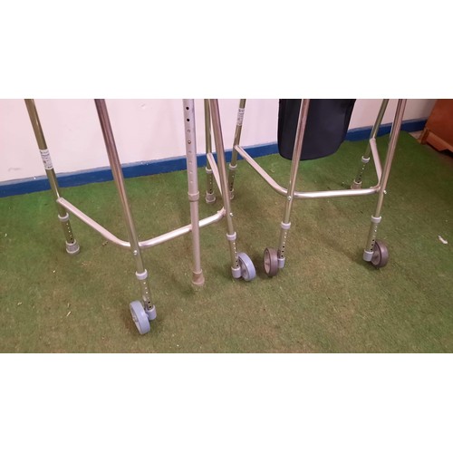 239 - TWO ZIMMER FRAMES