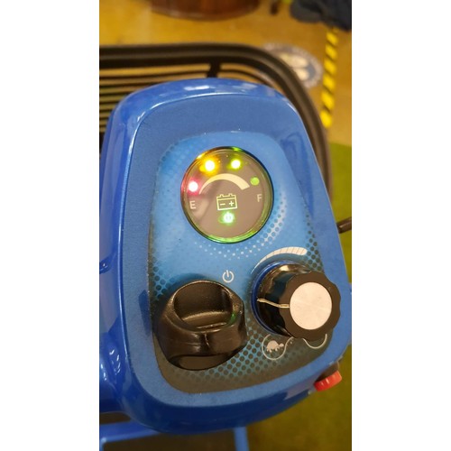 244 - MOBILITY SCOOTER IN BLUE WORKING BUT HAS no charger