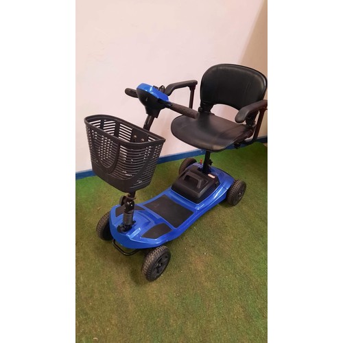 244 - MOBILITY SCOOTER IN BLUE WORKING BUT HAS no charger