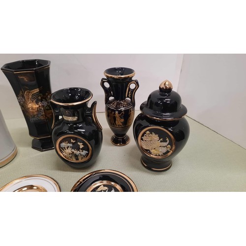 16 - collection of black and white vases with gold finish  detail