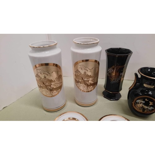 16 - collection of black and white vases with gold finish  detail