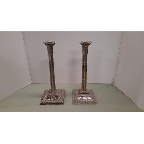 11 - PAIR OF SILVER PLATE 12 INCH CANDLE STICKS