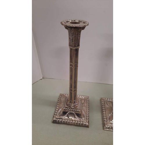 11 - PAIR OF SILVER PLATE 12 INCH CANDLE STICKS