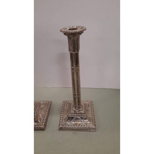 11 - PAIR OF SILVER PLATE 12 INCH CANDLE STICKS