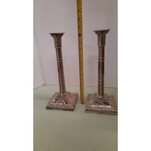 11 - PAIR OF SILVER PLATE 12 INCH CANDLE STICKS