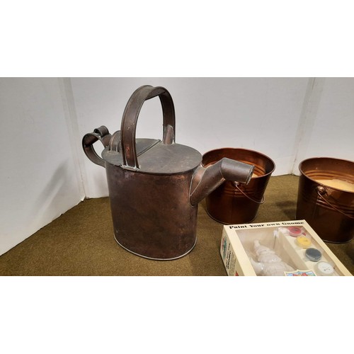 39 - watering can and other items