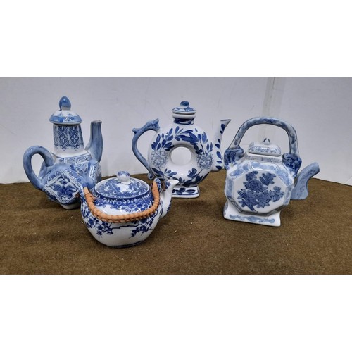 88 - blue and white oriental teapots