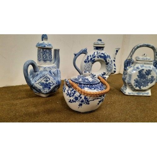 88 - blue and white oriental teapots