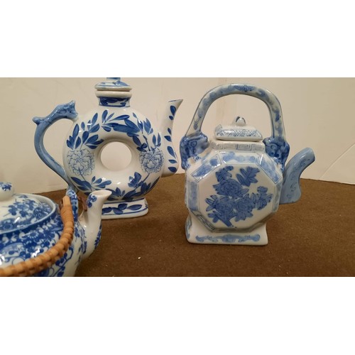 88 - blue and white oriental teapots