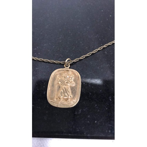 161 - 9ct St Christopher pendant with chain weight 5.86g