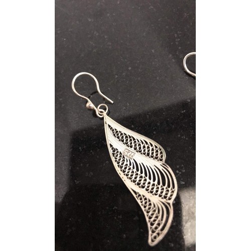 151 - Silver feather earrings weight 4.10g