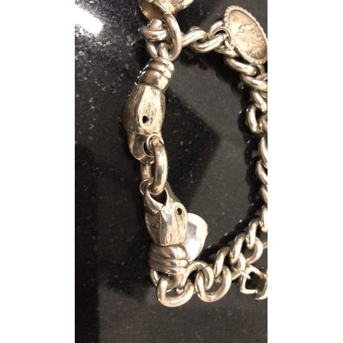 170 - Silver heavy charm bracelet with eagle clasp & 7 charms weight 99.98g