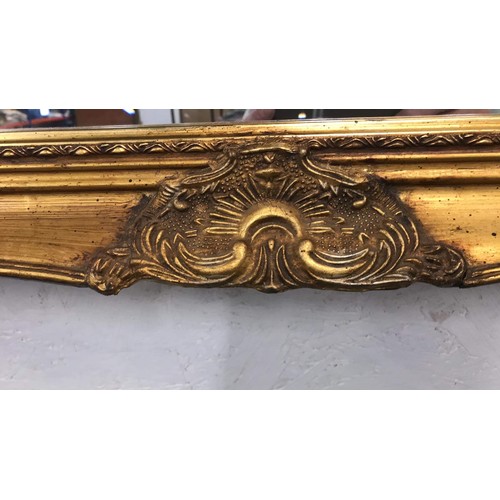 438 - LARGE ORNATE FRAMED MIRROR