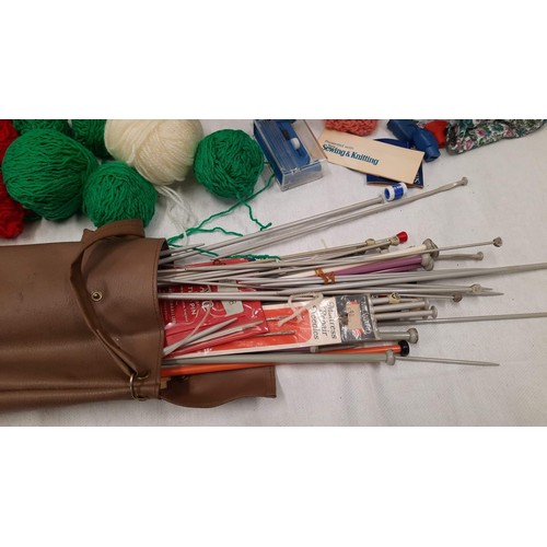 337 - TARTEN CASE OF KNITTING NEEDLES AND WOOL