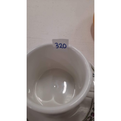 320 - TWO PORTMEIRION CUP AND SAUCERS