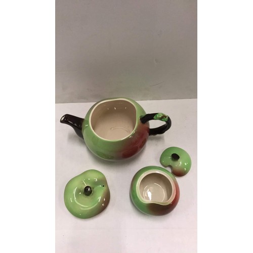 233 - Carlton ware teapot and sugar